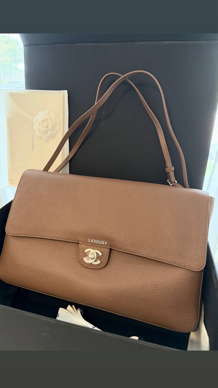 Original product photo of a tan shoulder bag from LAXOURY Real Picture